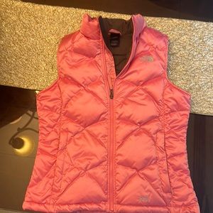 The North Face puffer vest. Brand new. Pink with brown lining. Size XL (18)